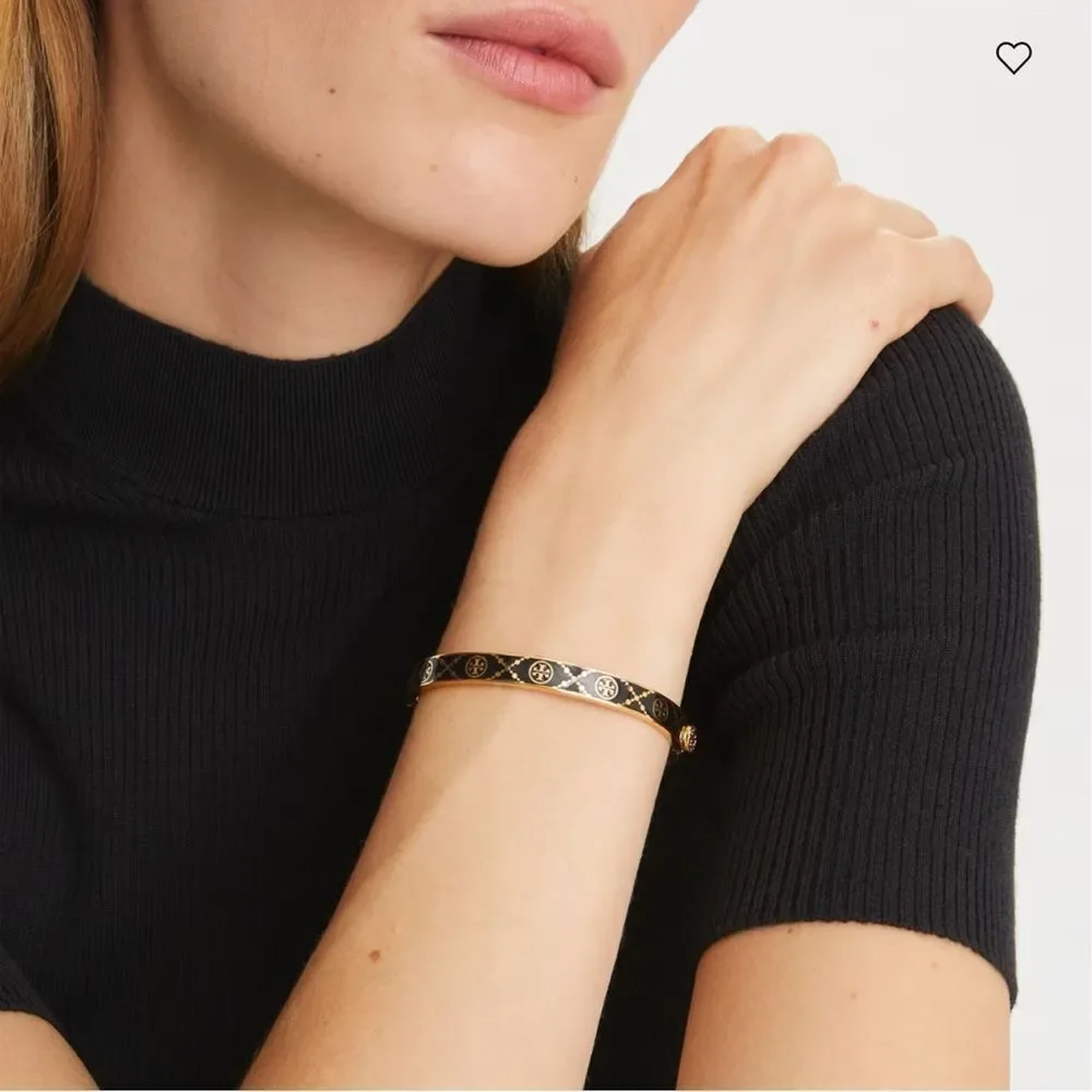 TORY BURCH MONOGRAM HINGE BRACELET BLACK AND GOLD LOGO BANGLE